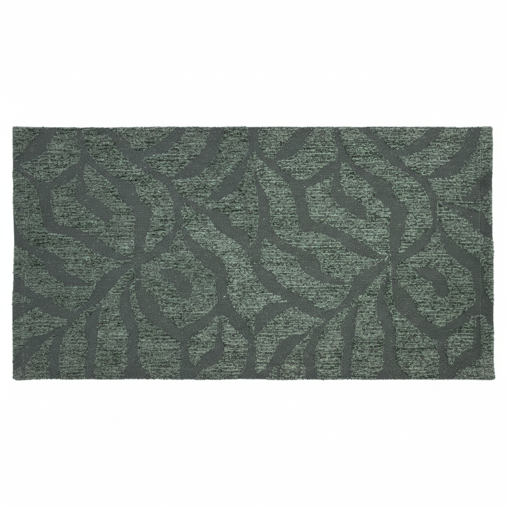 Forest Bloom Embroidered Rug flat lay showing deep forest green abstract leaf pattern on white background