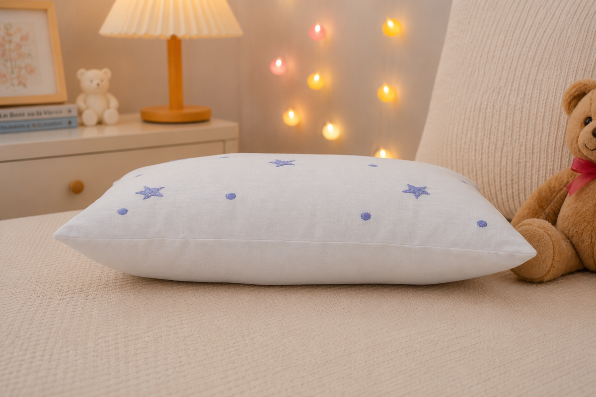 Starry Night Baby Pillow side view showing plush fill and full pillow profile